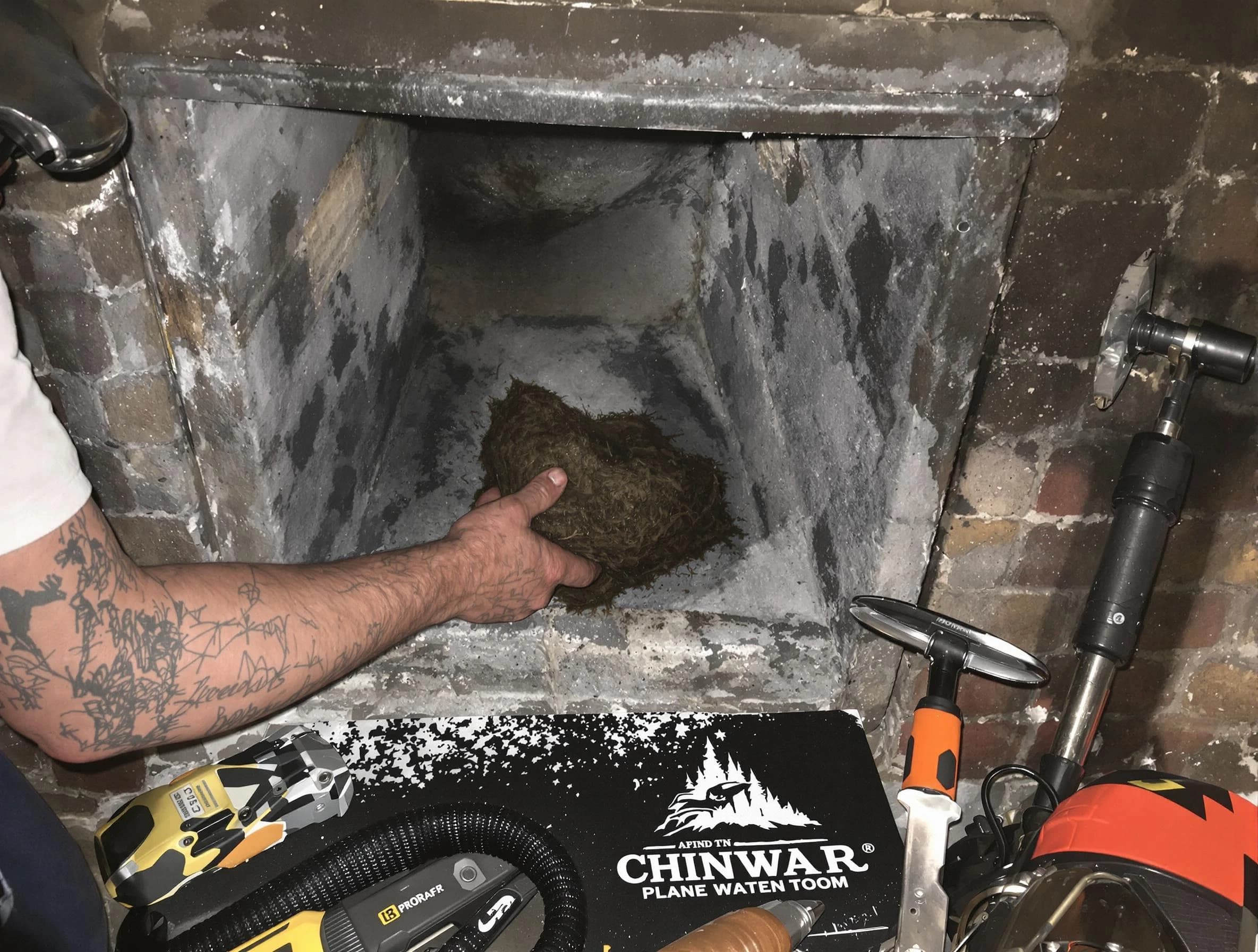 Lodi Chimney Sweep safely removing debris and screening chimney in Lodi, NJ